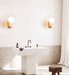 Travertine Pebble Wall Light - Simprolos